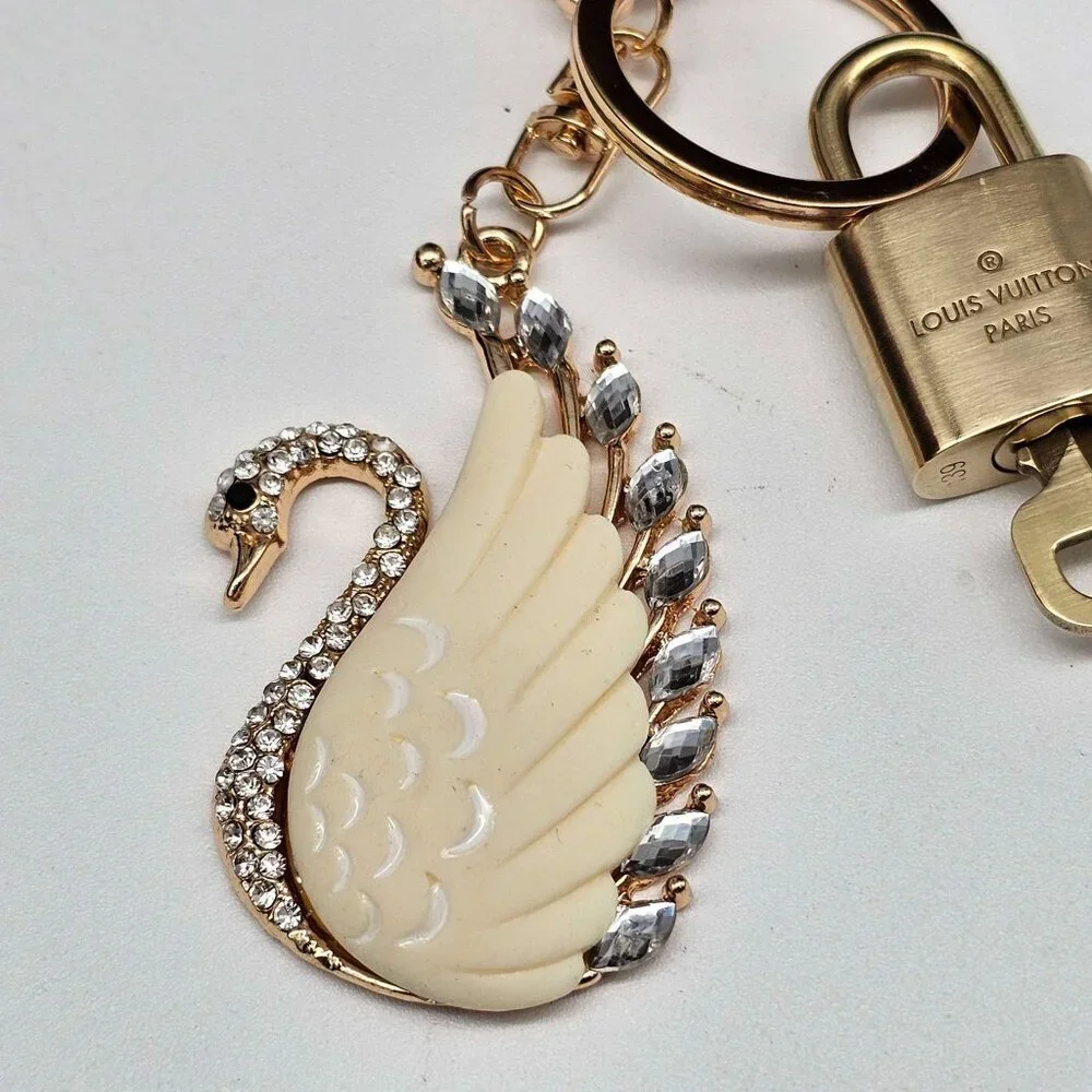 Louis Vuitton Authentic Gold Padlock 🔒 Key + Unbranded Keychain Swan Bag Charm
